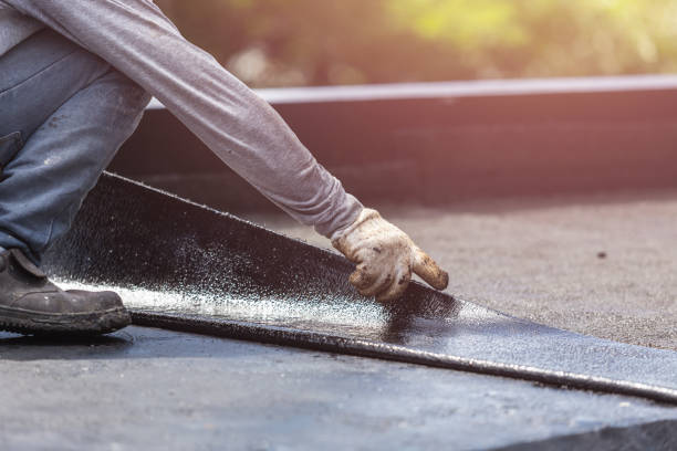 Professional Basement Waterproofing technician working in Augusta, MI